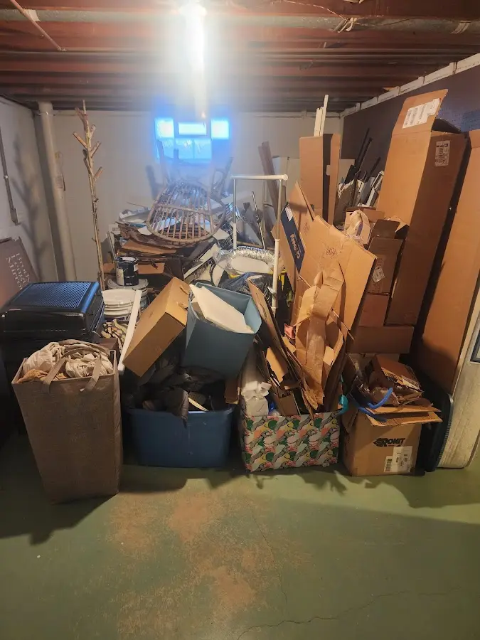 Roll-off dumpster container at job site for 2 Yard Dumpster Rental in Woodcliff Lake